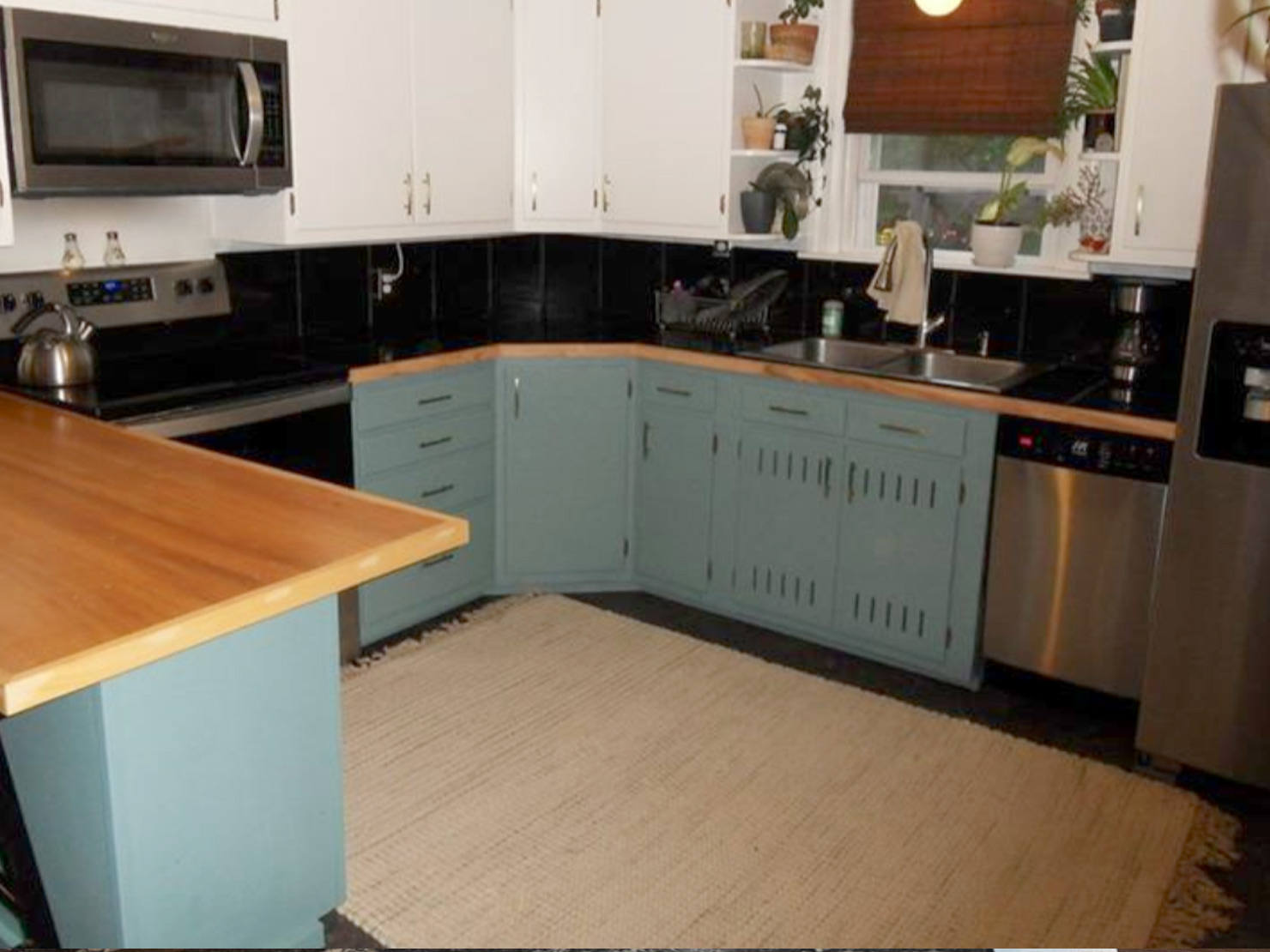 Original kitchen wall before tile installation